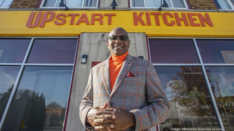 Bishop Walter Harvey stands outside Upstart Kitchen in Milwaukee's Sherman Park neighborhood.